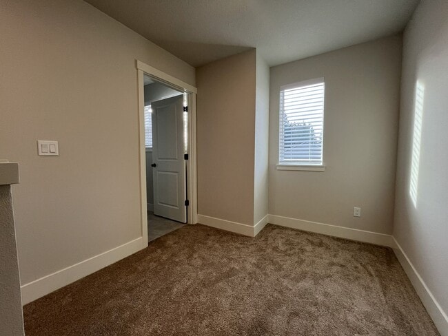 Building Photo - Modern 2025-Built 4 Bedroom Home with EV Charging, 5kW Solar, Open-Concept Living, Scenic Outdoor...