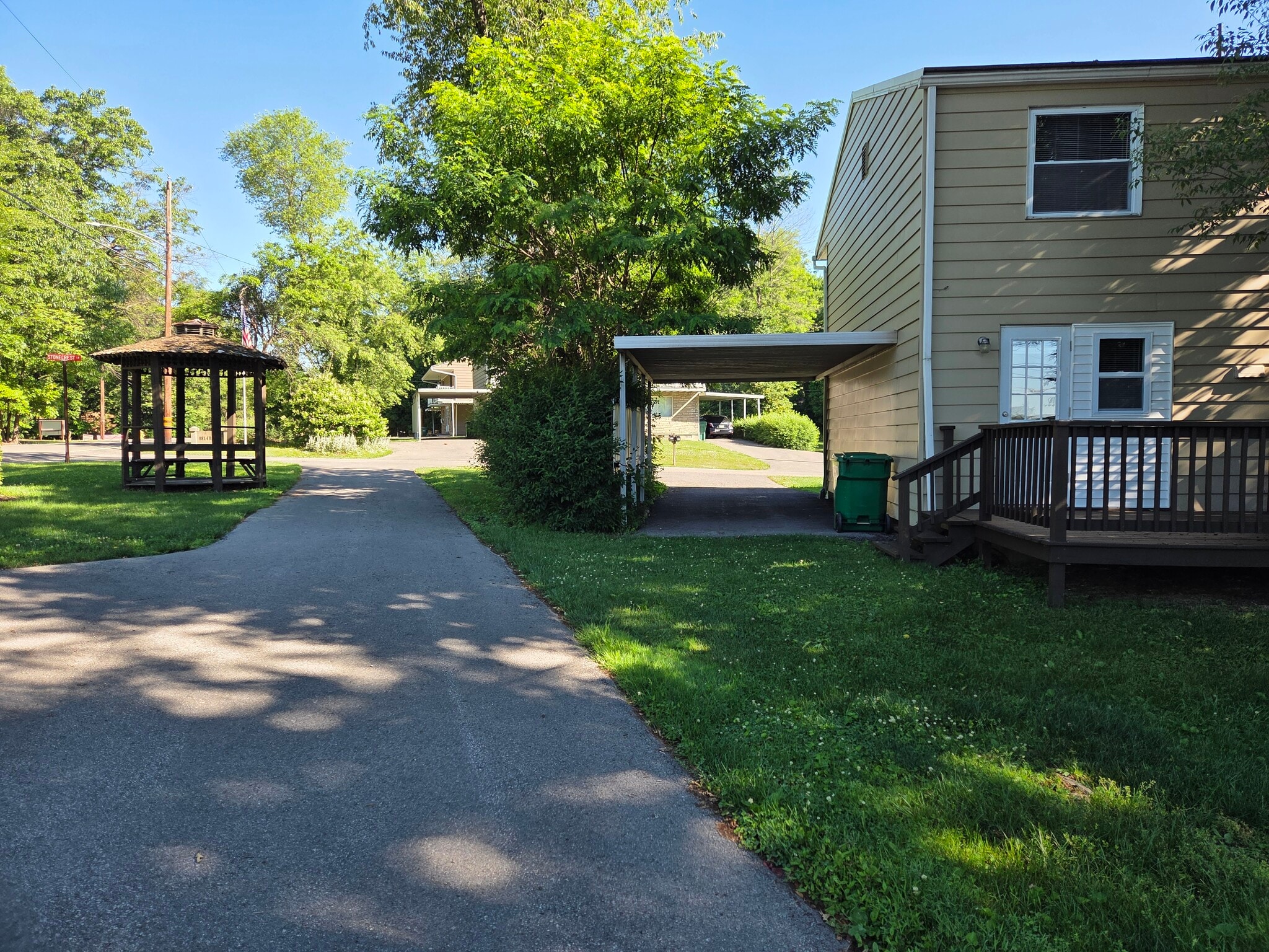 Rear of house with carport and deck. - 102 Stonecrest