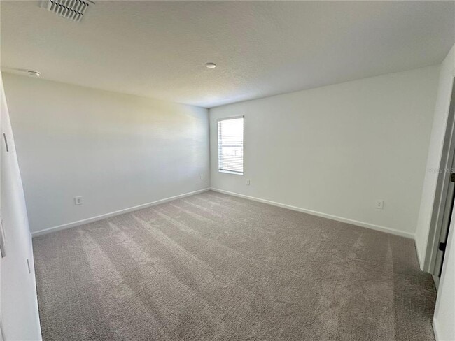 Building Photo - 5675 Portico Pl