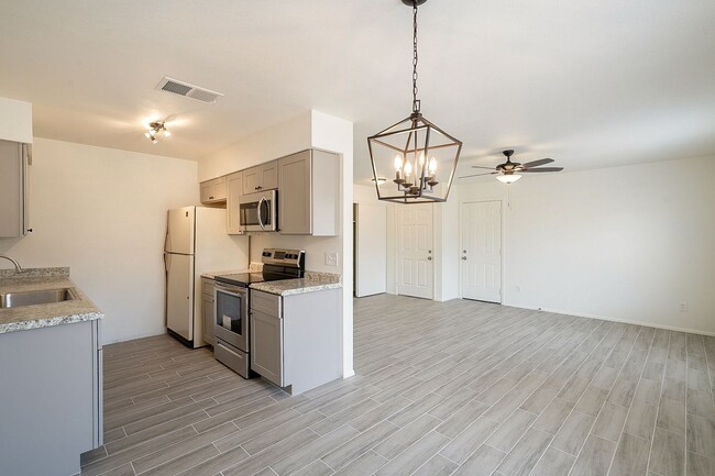 Primary Photo - Updated home with large backyard & 2 car g...