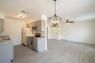 Building Photo - Updated home with large backyard & 2 car g...