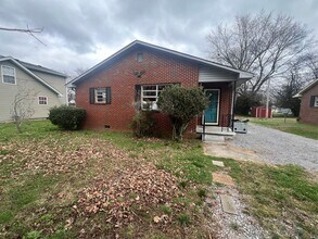 Building Photo - Three bedroom home with XL garage!