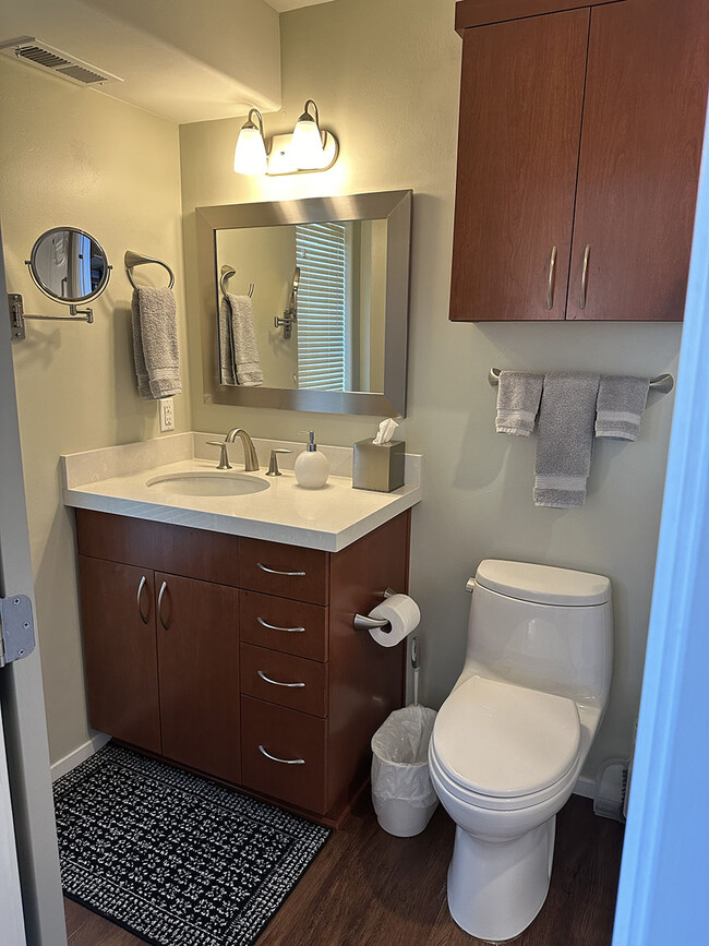 Bathroom with magnifying mirror. - 7079 Engineers Rd