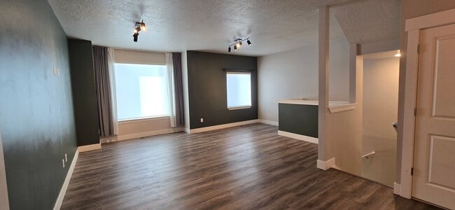 Building Photo - Come check out this beautiful 3 story town...