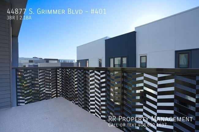 Building Photo - Brand New Top Floor Condo in Excellent Fre...