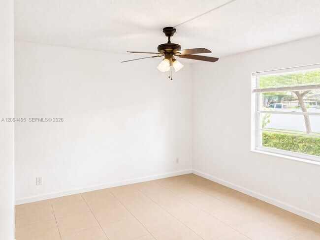 Building Photo - 8750 Royal Palm Blvd