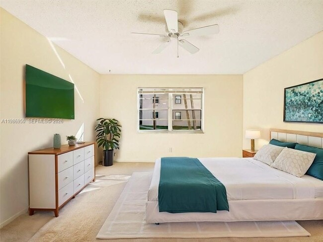 Building Photo - 6090 N Sabal Palm Blvd