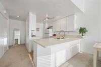 Building Photo - Thoughtfully Remodeled Condo W/ Attached G...