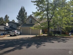 Building Photo - Spacious and charming, this two-story 4 be...