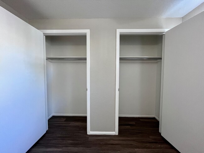 Explore the elegance and functionality of dual closets in this modern living space. - 591 West Prentice Avenue