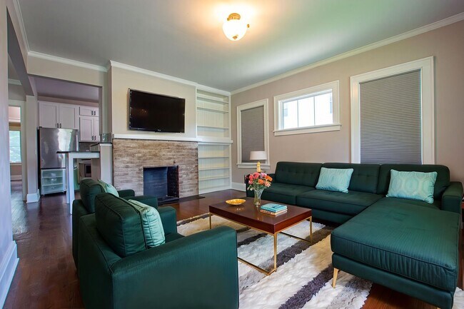 Building Photo - Adorable Brick 4 Bedroom Ranch with Finish...