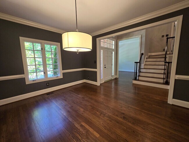 Building Photo - Custom Brick Home on Private Wooded Lot in Cary's Prestigious Wessex Community