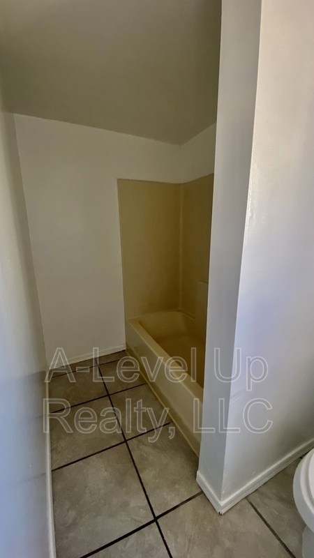 Building Photo - 3909 S 14th Ave