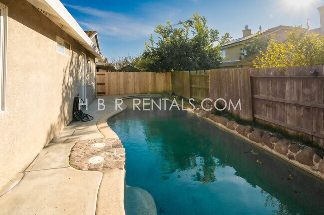 Building Photo - Charming 3-Bedroom Home with a Beautiful Pool in Lathrop! *POOL SERVICE INCLUDED*