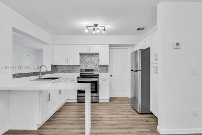 Building Photo - 3040 NW 96th St