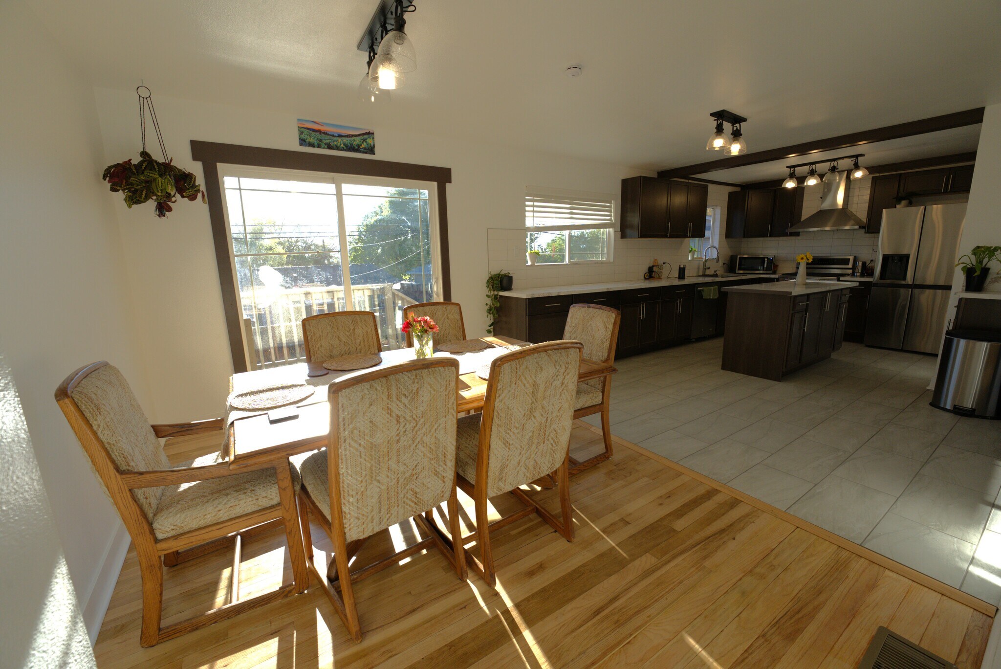 dining area with backyard entrance and kitchen - 1340 Rayburn Dr