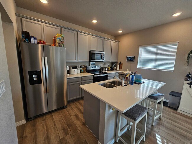 Building Photo - Welcome to this beautiful 3-bedroom, 3-bathroom home located in Lorson Ranch!!