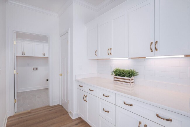 Building Photo - FOR LEASE - NEW BUILD TOWNHOME LOCATED IN THE VILLAS AT FIVE OAKS!