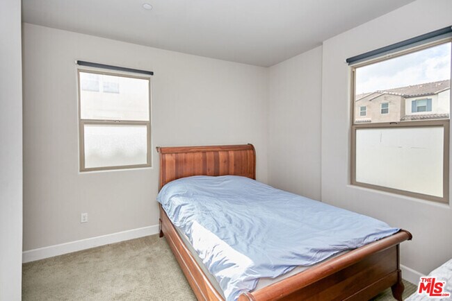 Building Photo - 9831 Alburtis Ave