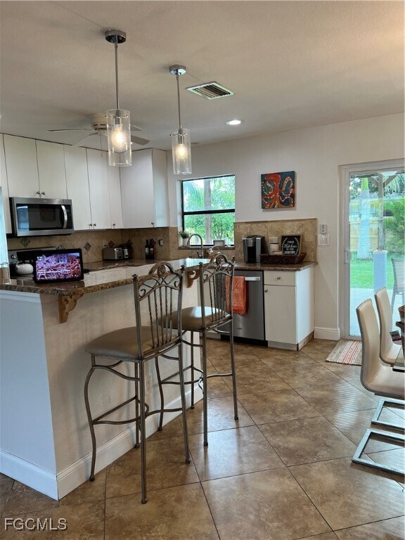 Building Photo - 852 NE 7th Pl