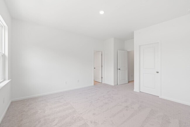 Building Photo - Welcome home to this stunning brand-new townhome in one of Indian Trail's newest and most desirab...