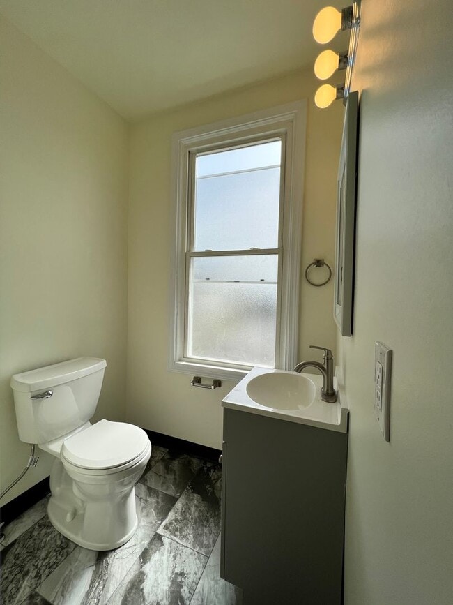 Building Photo - Updated 3BR house with multi-car off street parking!