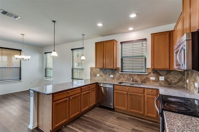 Building Photo - 6209 Garden Rose Path