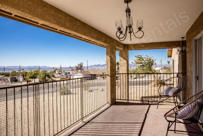 Building Photo - FURNISHED WITH INDOOR POOL