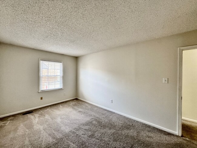 Building Photo - READY NOW!! Fenced Patio - Pet Friendly - Over 1,500 Square Feet!!