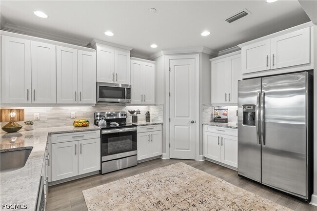 Building Photo - 9657 Montelanico Loop