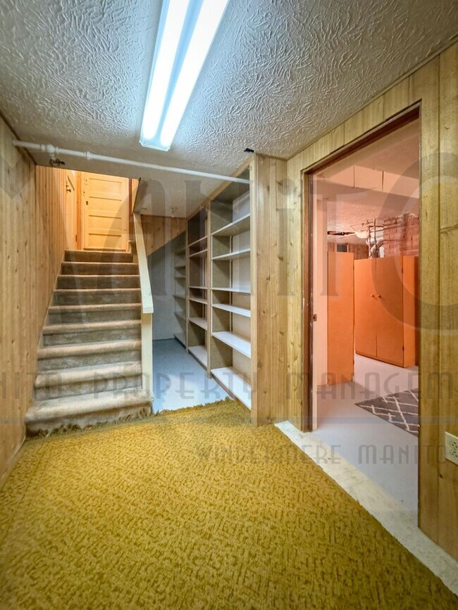 Building Photo - **COMING SOON** Beautiful Down River Brick Bungalow with River Views
