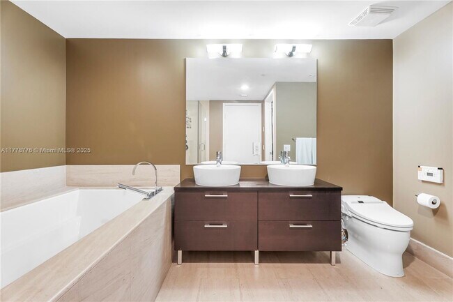 Building Photo - 5875 Collins Ave