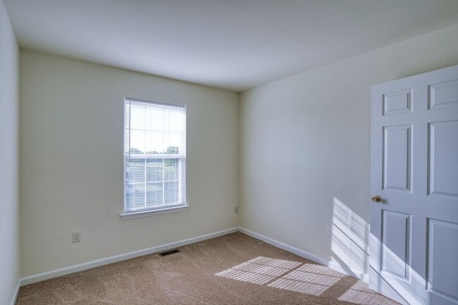 Building Photo - New, New, New - Spacious 3 Bedroom Townhouse with a Finished Basement !!