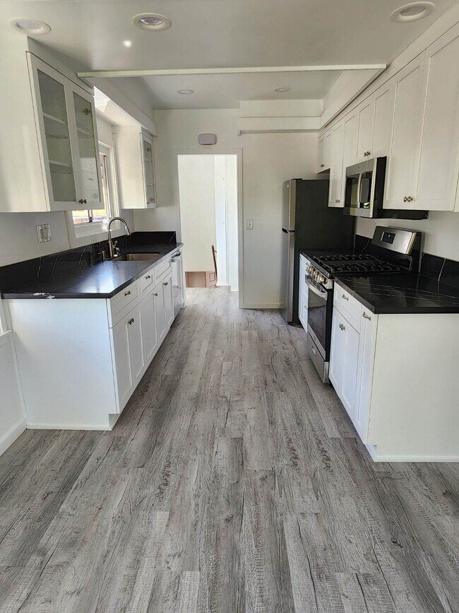 Spacious remodeled kitchen with all new appliances - 1251 S Sycamore Ave