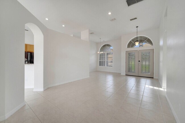 Building Photo - Stunning 4/3 with Fence Enclosed Yard in t...