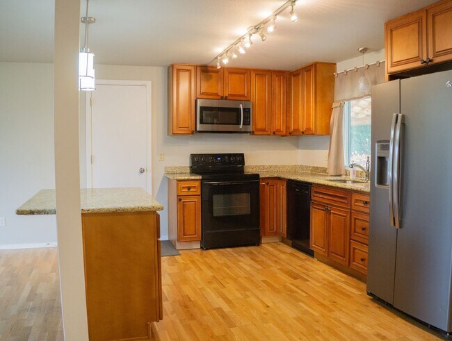 Building Photo - A Charming 3-Bedroom Rambler!