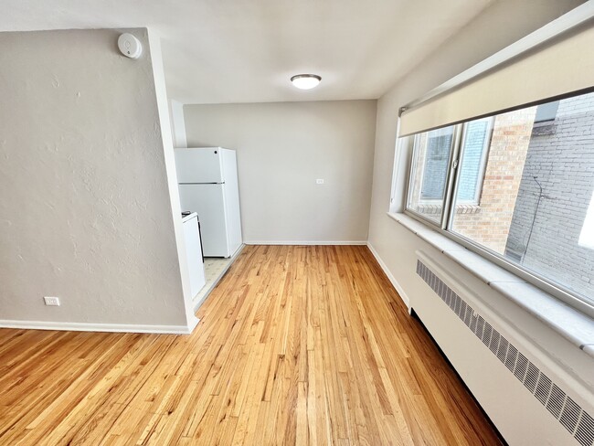 Experience the charm of this cozy kitchen nook, perfect for morning coffee with a view. - The Birney Apartments