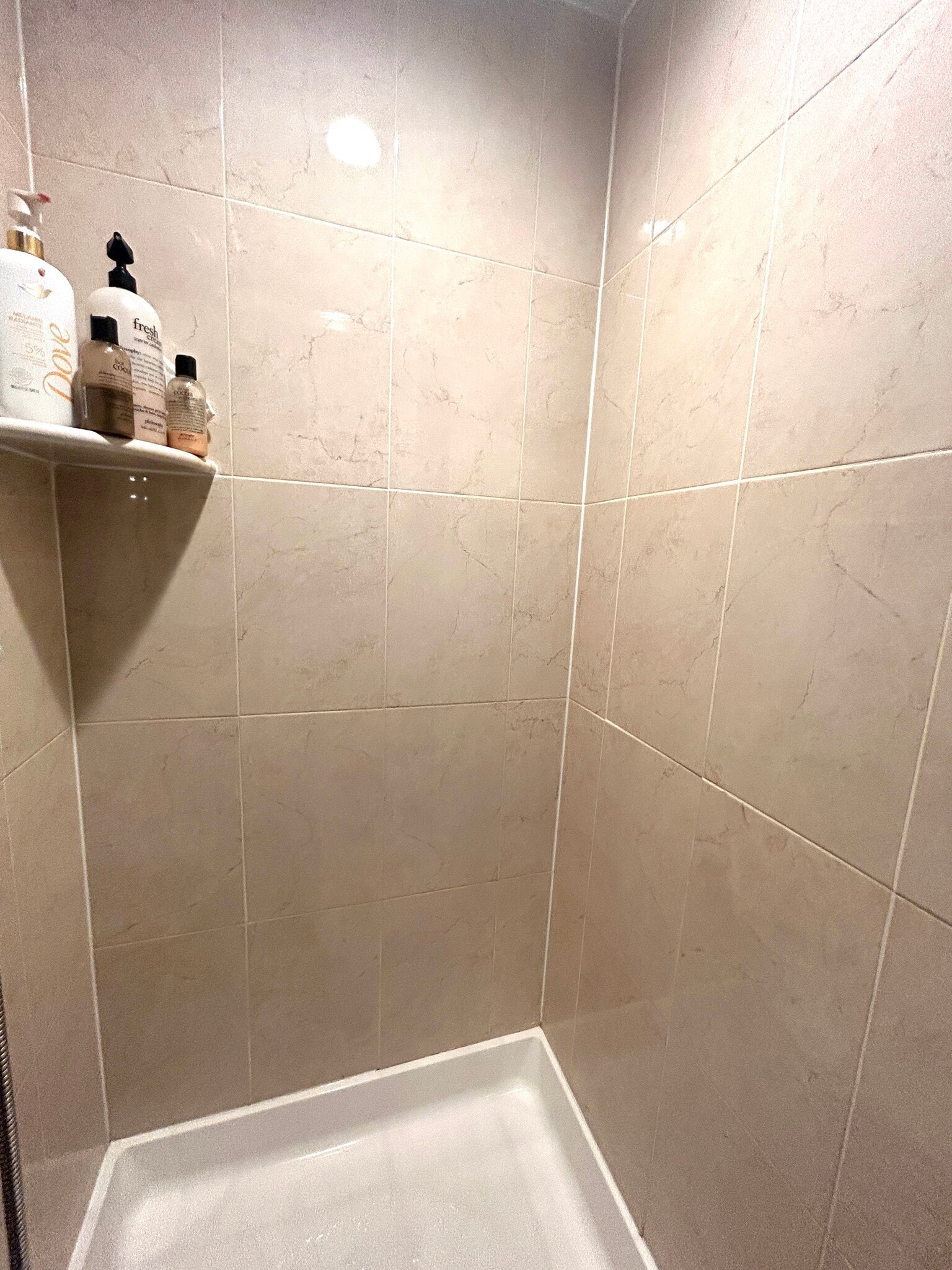 Bathroom updates include shower tiles and vanity. - 9 Augusta Dr