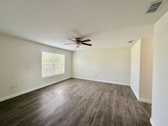 Building Photo - GORGEOUS, Large Completely Renovated Two-Story 4/2.5 PLUS LOFT in POINCIANA VILLAGES!