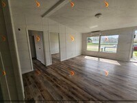 Building Photo - Experience Brand New Comfort in This Renov...