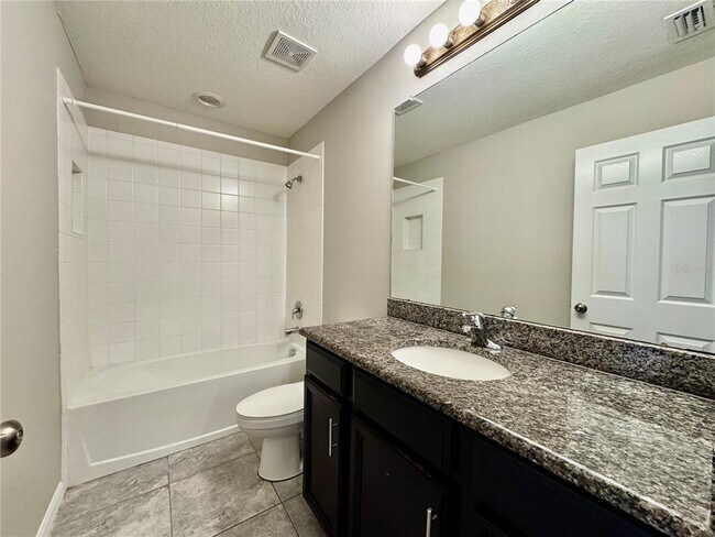 Building Photo - 7208 Grand Elm Dr