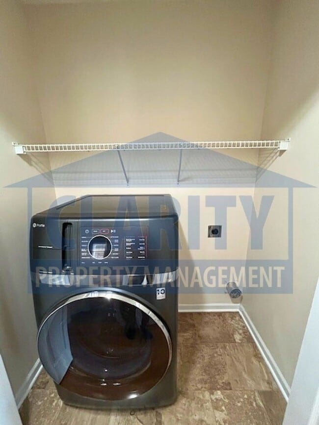 Building Photo - Three bedroom with attached garage!