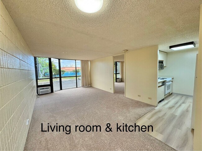 Building Photo - Charming 2 bed, 2 bath, with 1 secured covered parking stall and In-Unit Washer/Dryer. Available ...