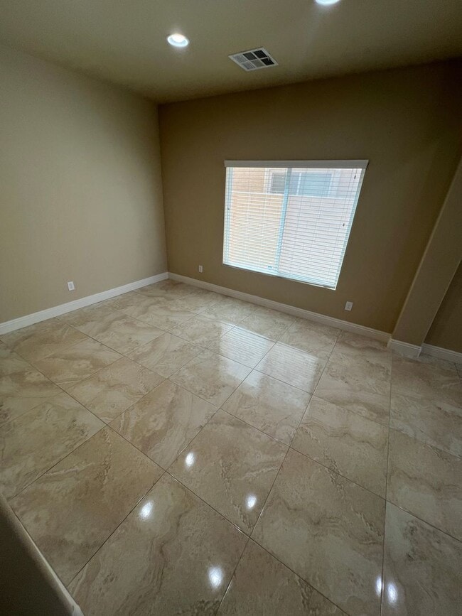 Building Photo - A Fantastic 4 Bedroom Home with the primary Downstairs, in Silverado Ranch