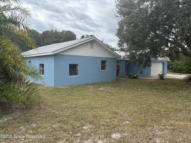 Building Photo - 6335 S Tropical Trail