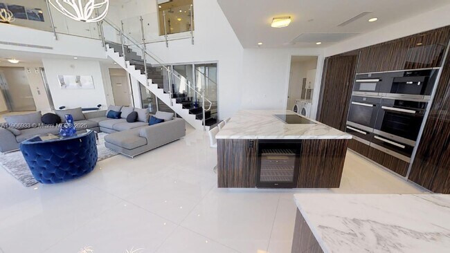 Building Photo - 18555 Collins Ave