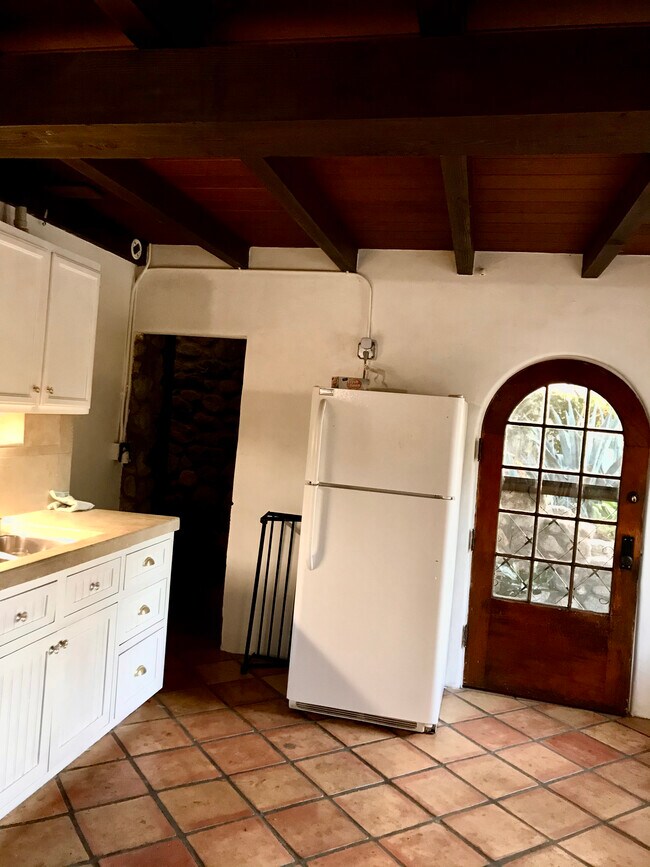 Kitchen- front door/ stairs to Living Room - 7964 Glenties Ln