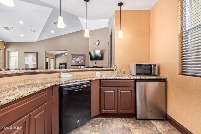 Building Photo - 9450 E Becker Ln