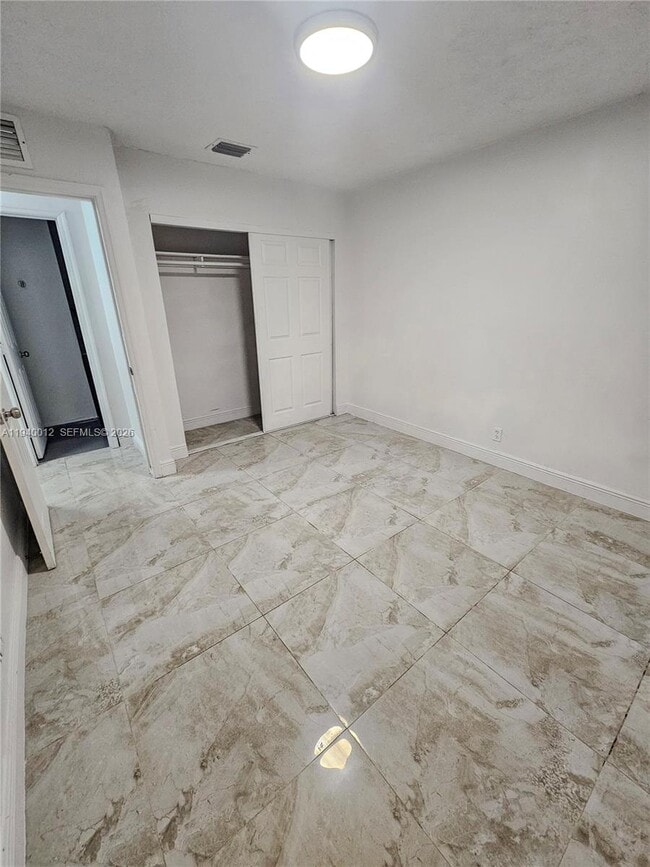 Building Photo - 5615 NW 27th Ct