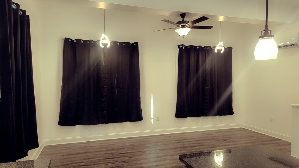 Living room 12ft ceilings - 806 N Ann St